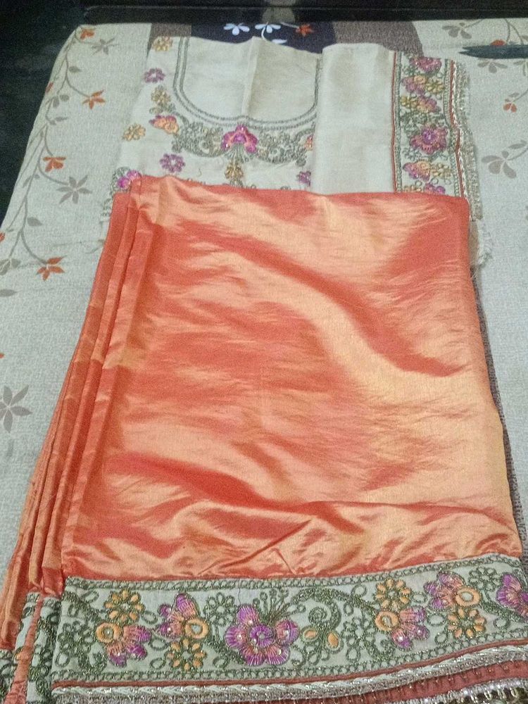 Elegant Unstitched Golden Blouse &amp; Orange Saree