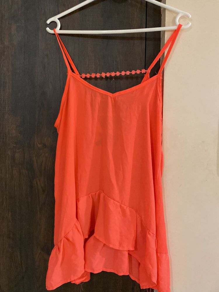 Coral Tank Top with Ruffle Detail