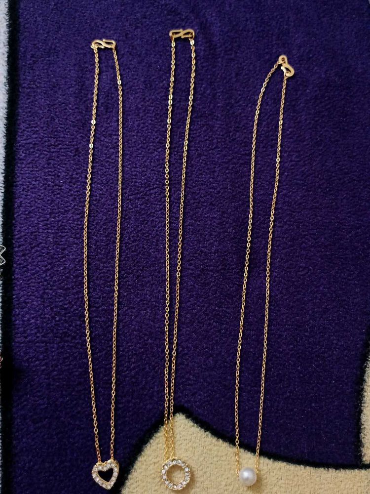 Graceful Gold Charm Necklace Trio