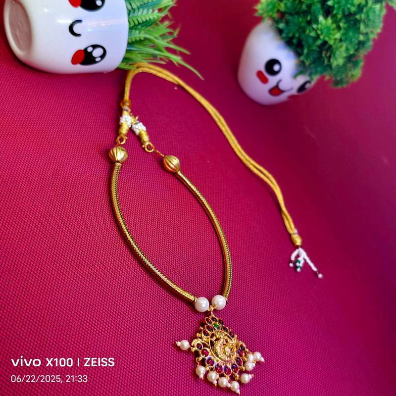 Elegant Gold-Toned Necklace with Pearl Accents