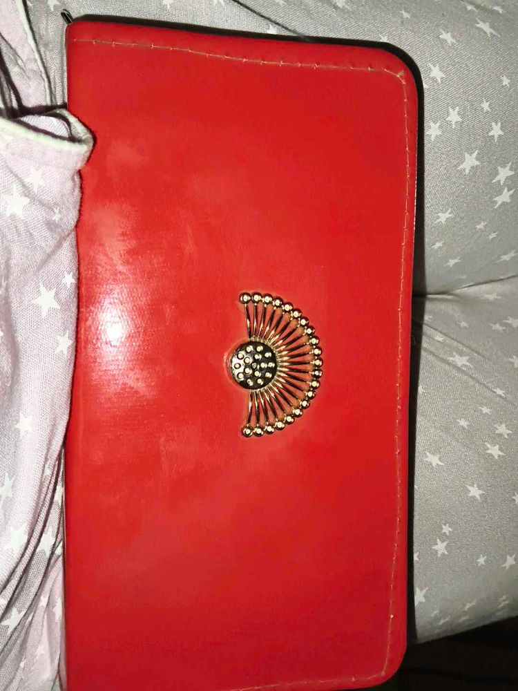 Red Clutch with Gold Embellishment
