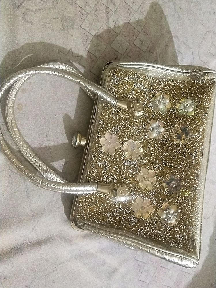 Heavy purse For Women With Beautiful Stone Work.