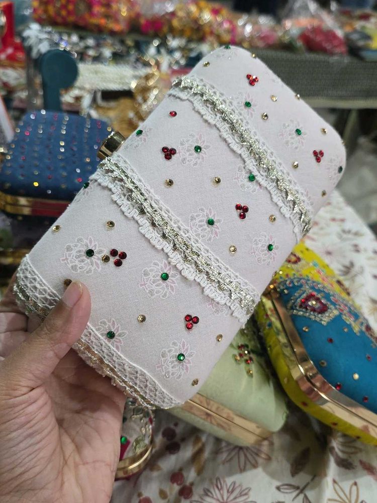 Laces Stones Hand Clutch With Sling