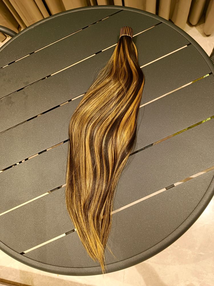 Pony Tail Hair Extensions In Blonde Highlights