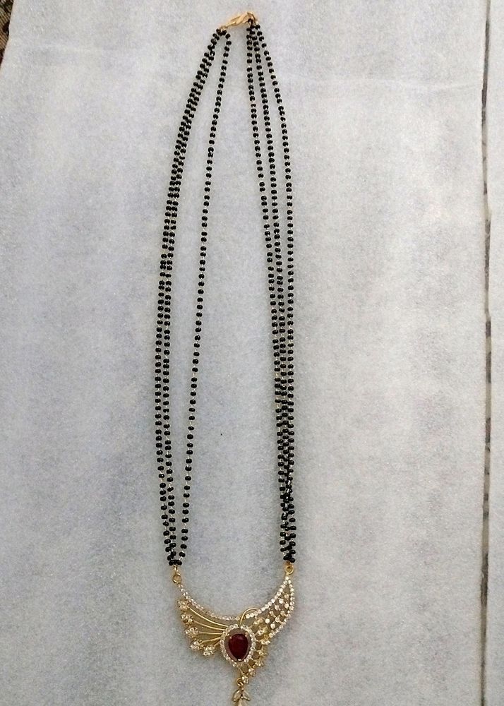 AD Mangalsutra Studded Stones.