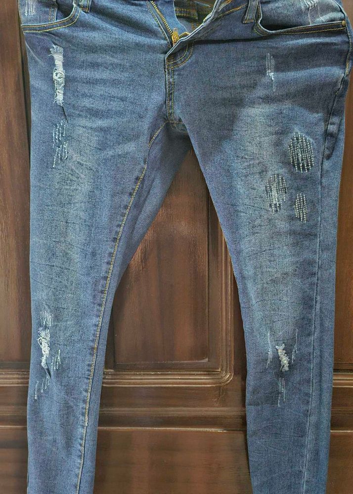 Distressed Denim Jeans