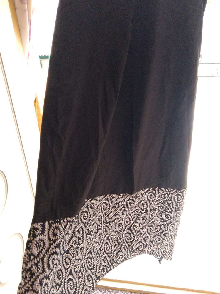 Black Skirt with Embroidered Hem