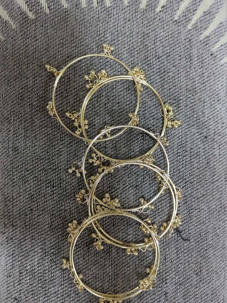 Set of 8 new Gold plated Bangles