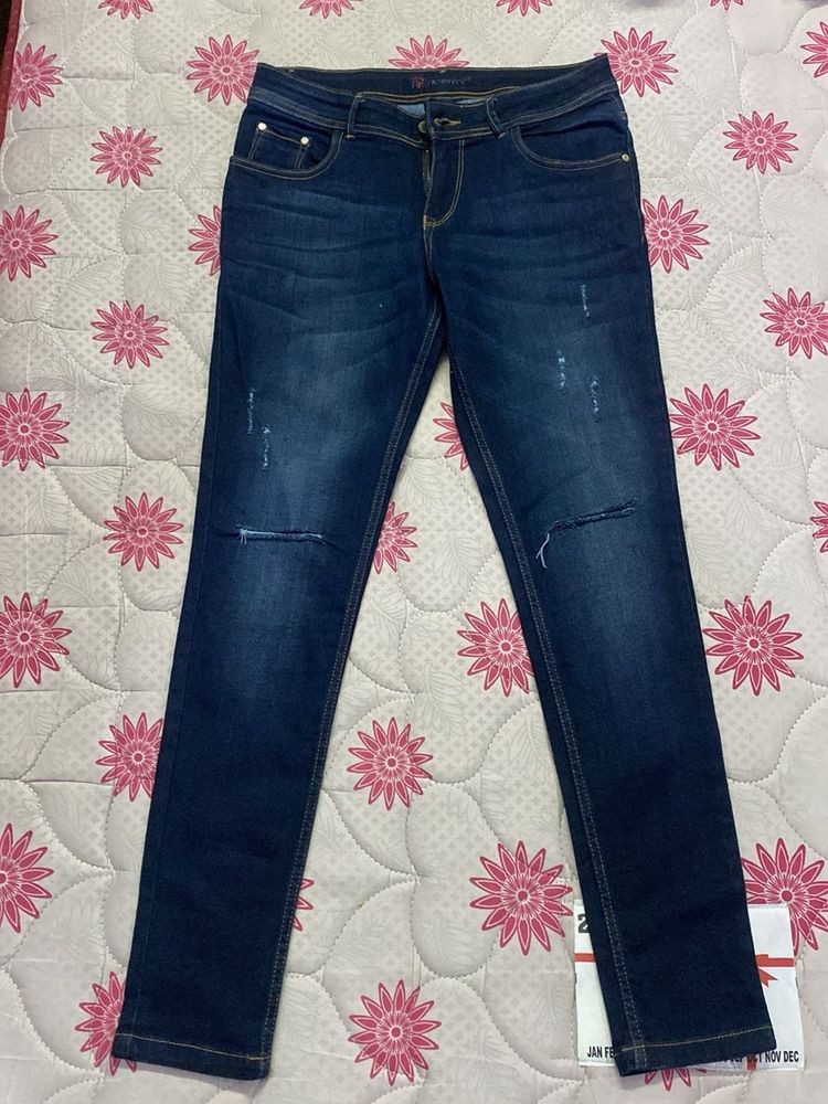 Ripped / Distressed Navy Blue Jeans