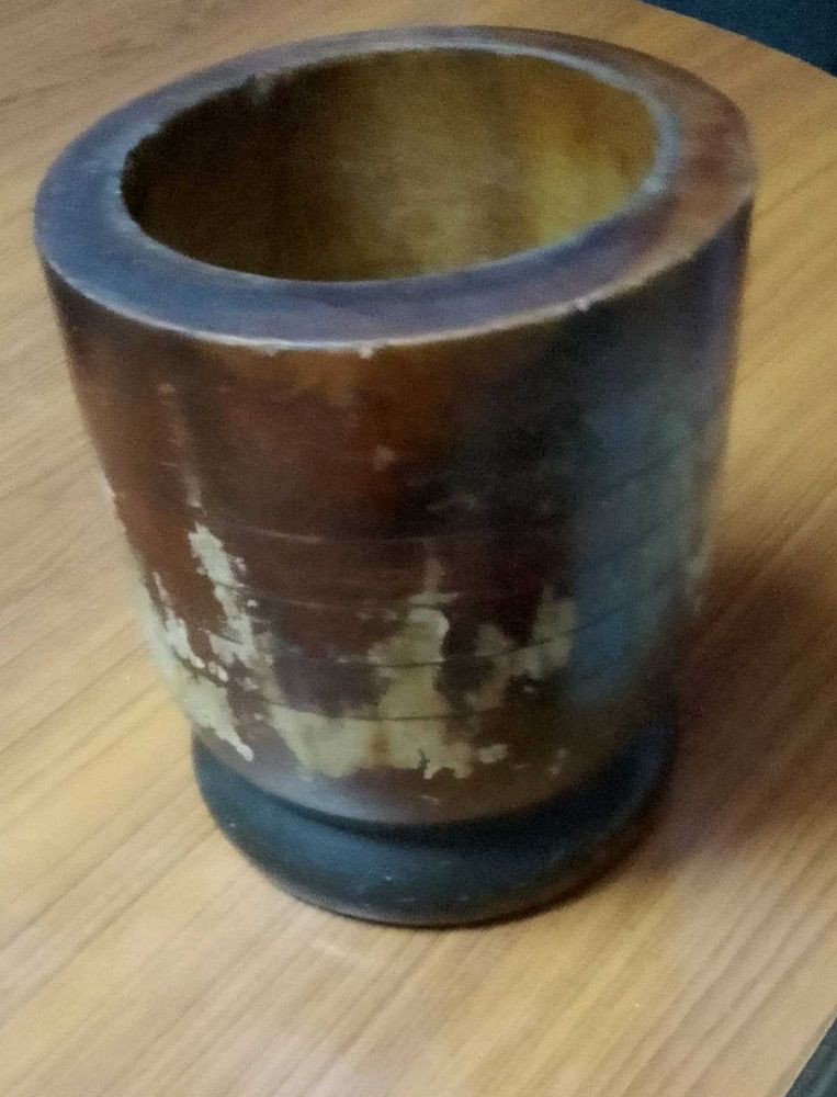 Wooden okhli