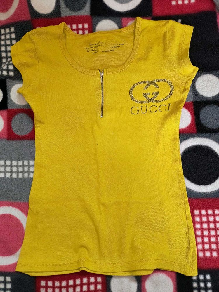 yellow and black top