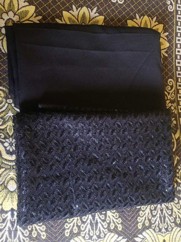 Elegant Black Clutch with Delicate Pattern