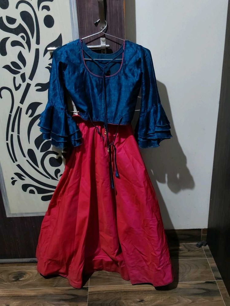 a blue and Rani colour choli lehenga with odni