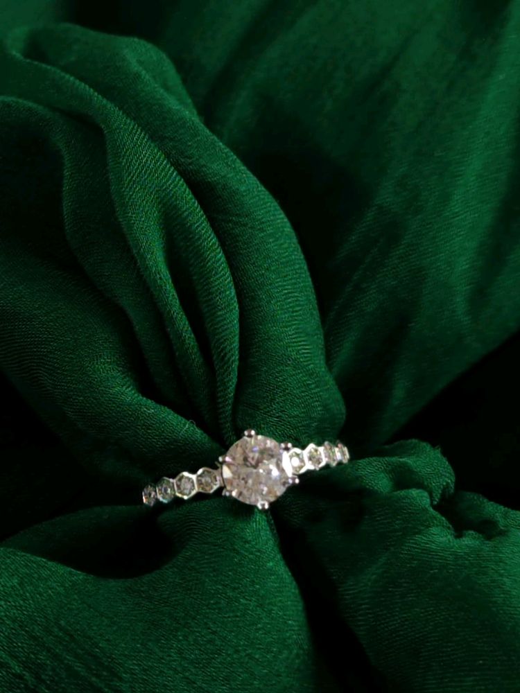 SOLITAIRE EMBEDDED WITH DIAMONDS