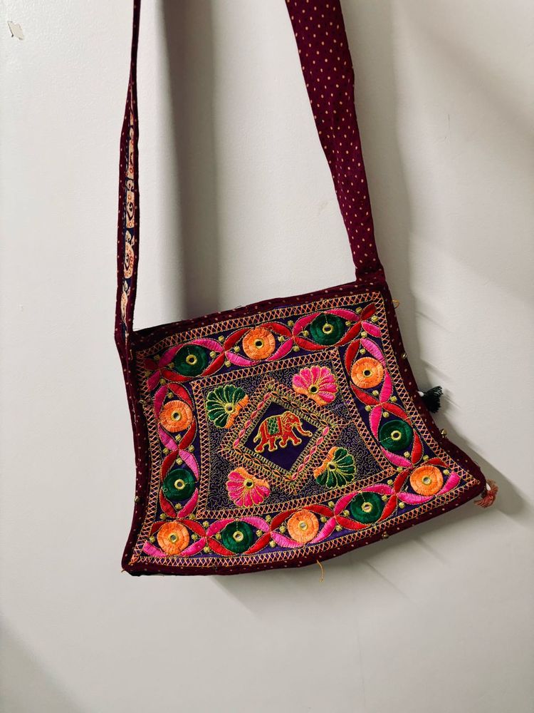 Freebie Embroidered Sling Bag
