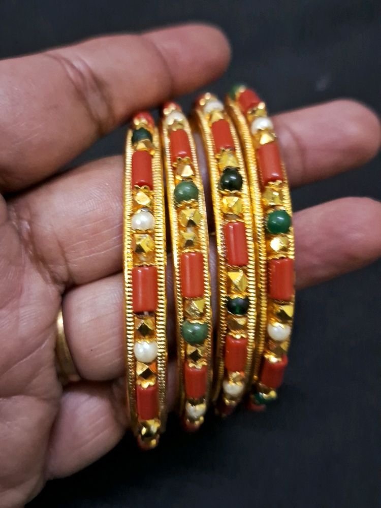 Beautiful coral and gold bangles Sz 2.8
