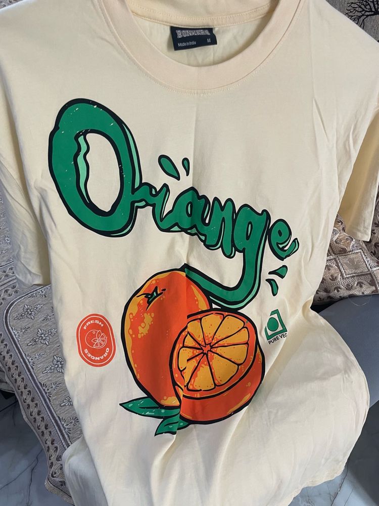 Bonkers Corner Orange Graphic Tee - Trendy!