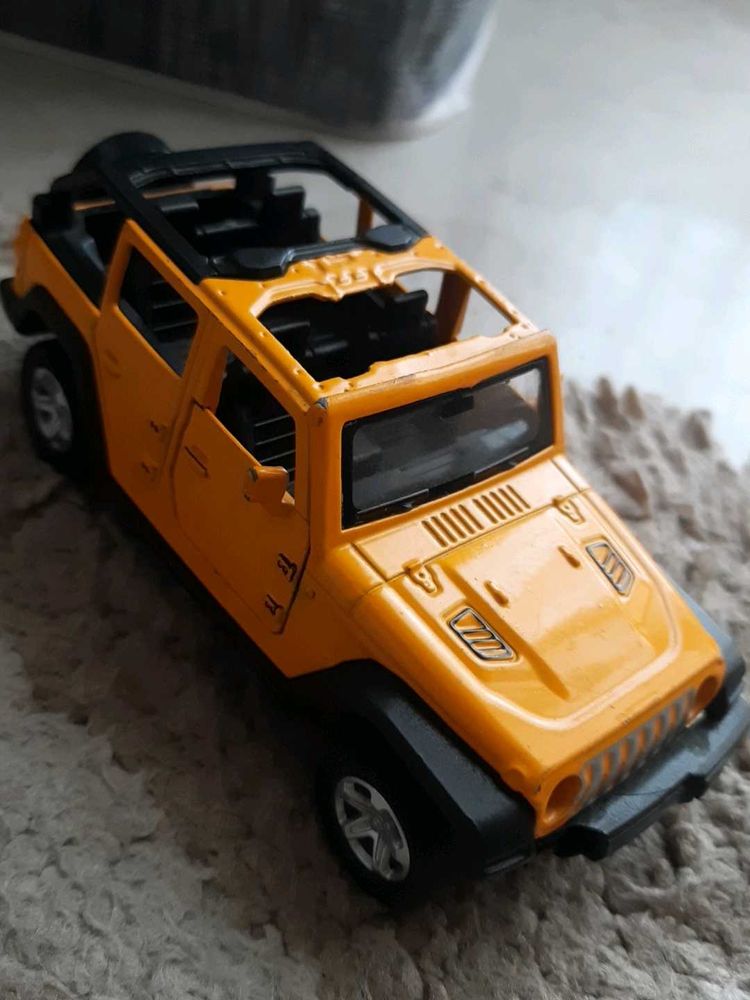 Yellow Jeep Wrangler Toy Model