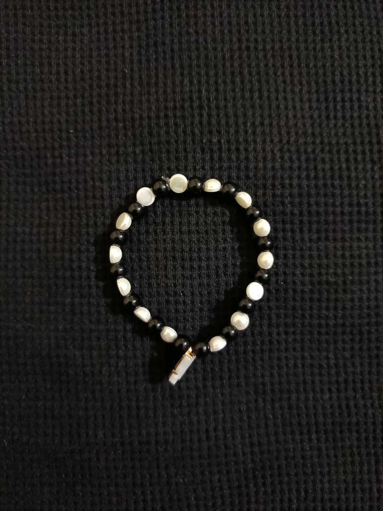 Black &amp; White Bead Bracelet With Butterfly Charm