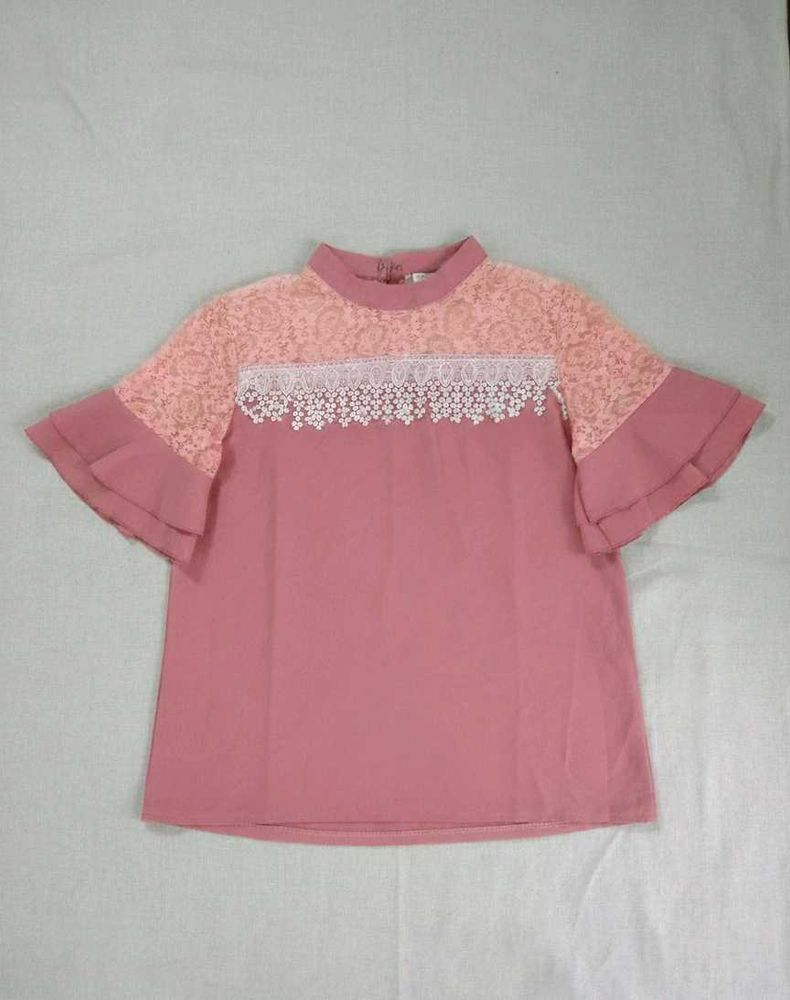 &#34;Sophistication meets sweet&#34; lace-detail top