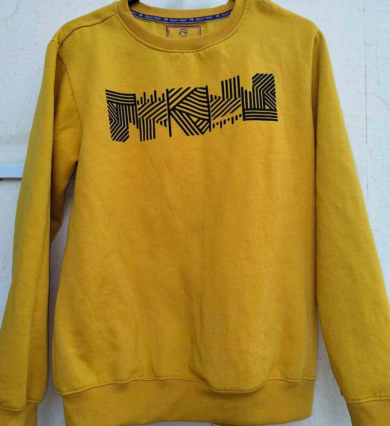 yellow pullover for men and women winter wear.