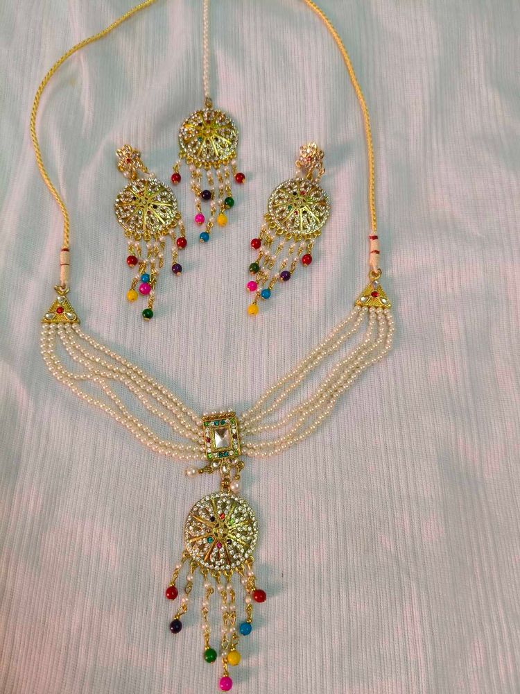 Beautiful Pearl Or White And Colourful Moti Haar.