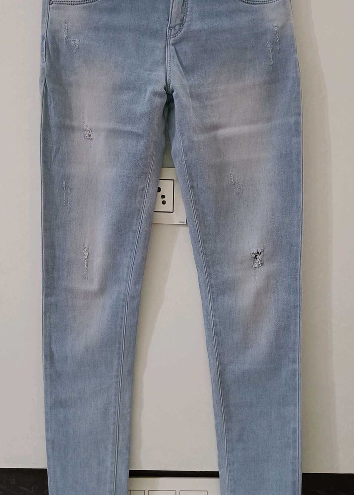 Light Wash Distressed Skinny Jeans
