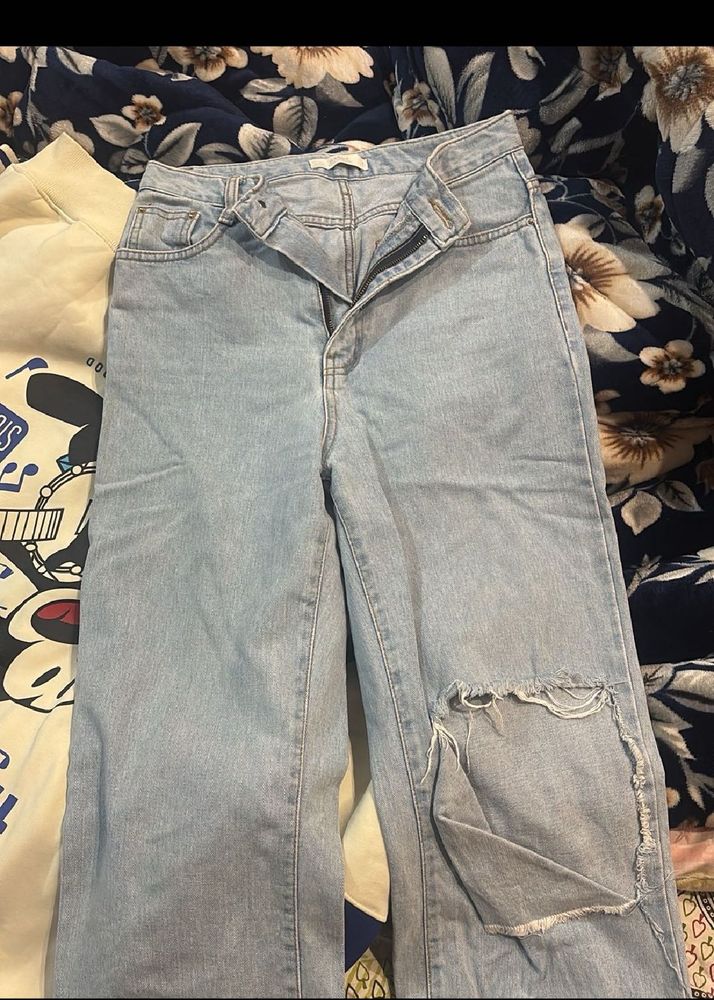 Ripped Light Wash Jeans