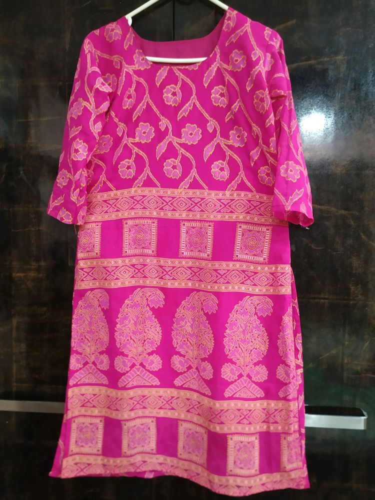 Stylish Prints Suit In Rani Pink Colour With Astar Inside