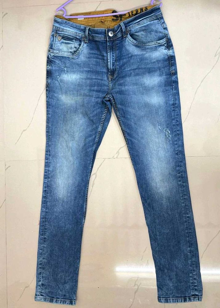 Toned Distressed Pantaloons Blue Jeans