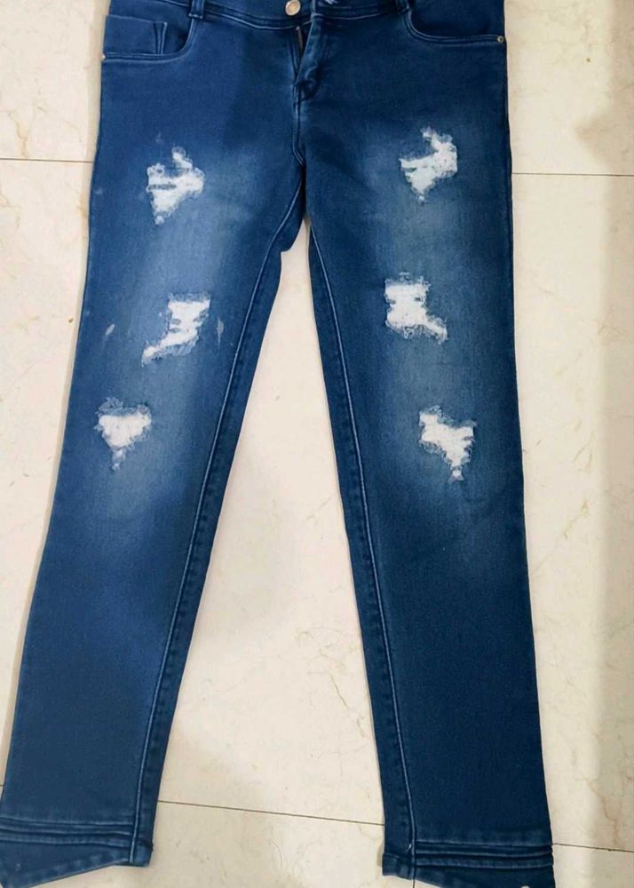 Ripped Blue Denim Jeans