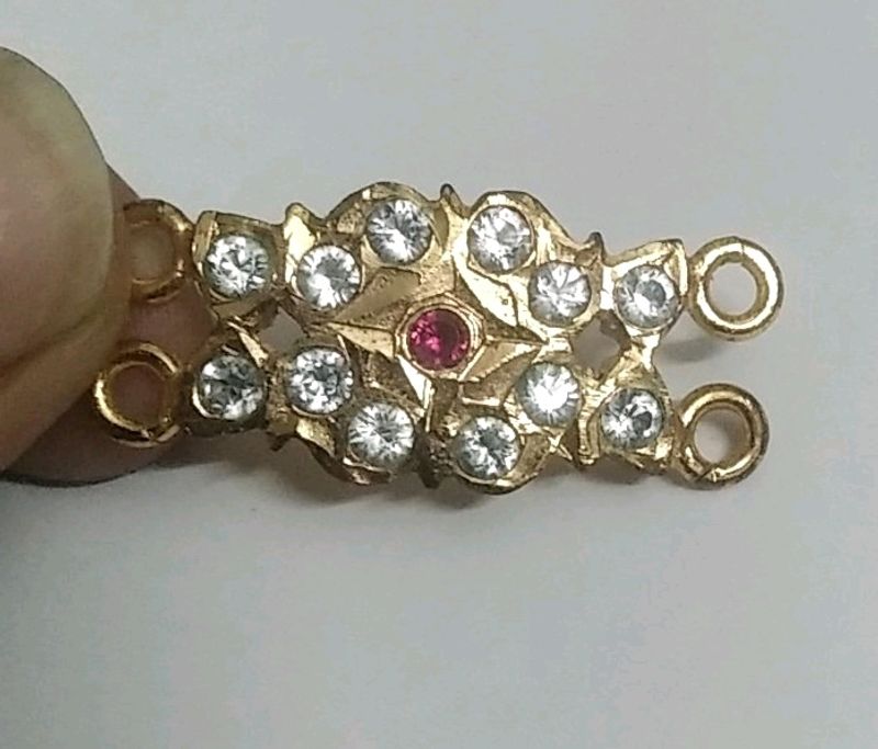 Light Used Gold Covering Mogappu Dollar