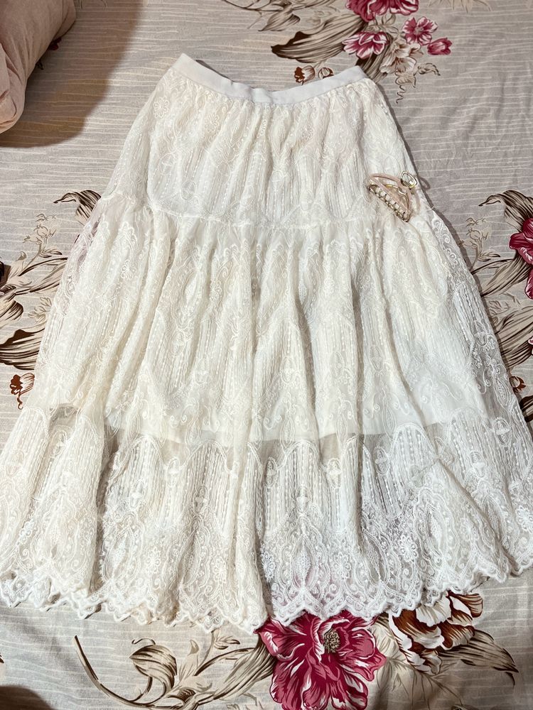 Mid Length Skirt With Beautiful Prints.