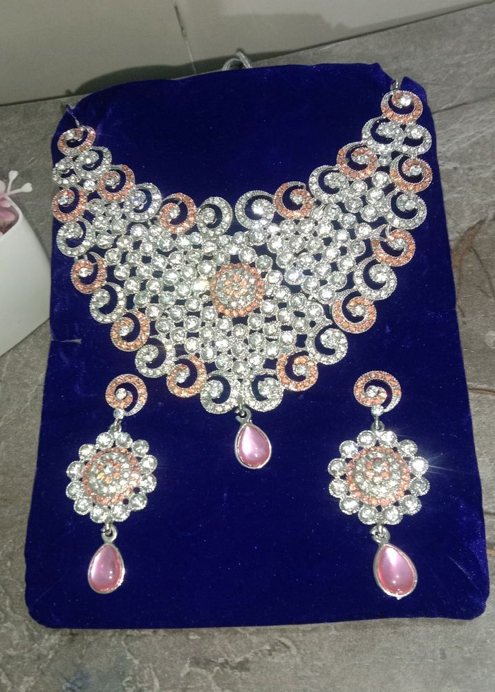 Pink Coral Spiral Neck Set.