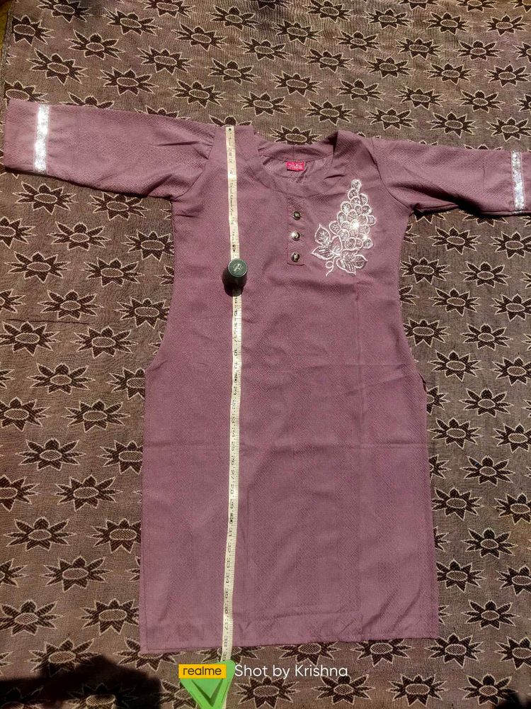 A Beautify Kurti With Beeds Work Design
