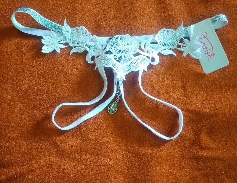 Unisex Lacy White Thong with Charm
