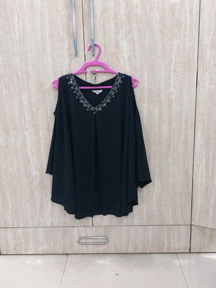 A Black Party Cape Top.