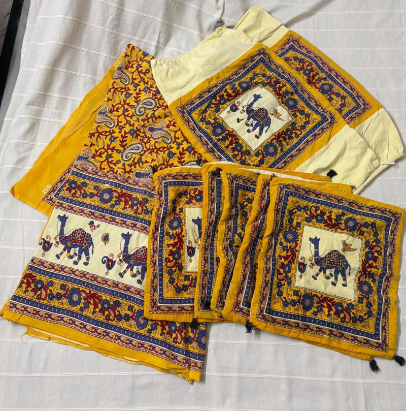 Bedsheet, 2 Bolster Covers, 5 Cushion Covers