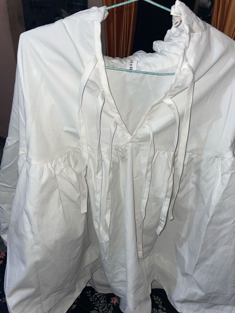 White long sleeve top