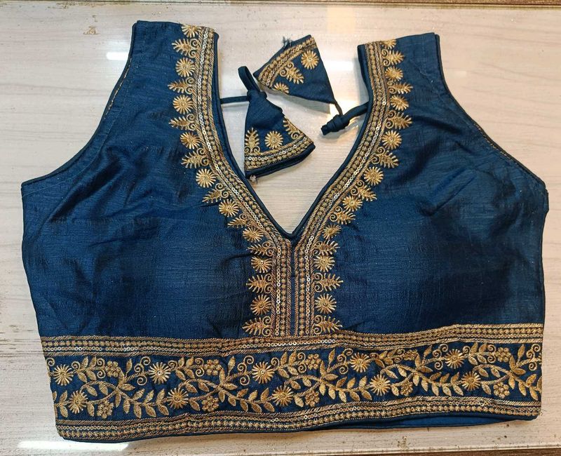 Embroidered blue blouse