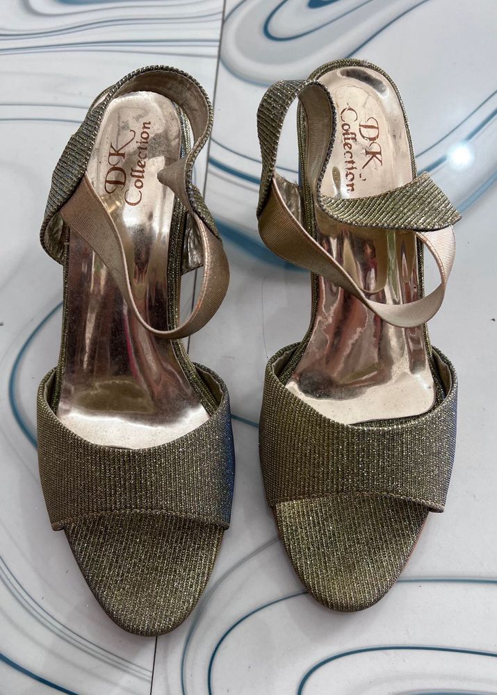 Gold Heels never used new