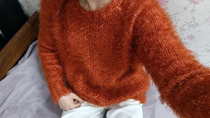 orange fury sweater