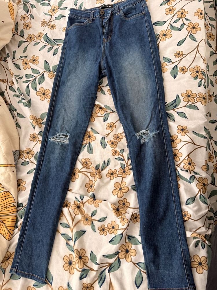 Ripped Knee Denim Jeans