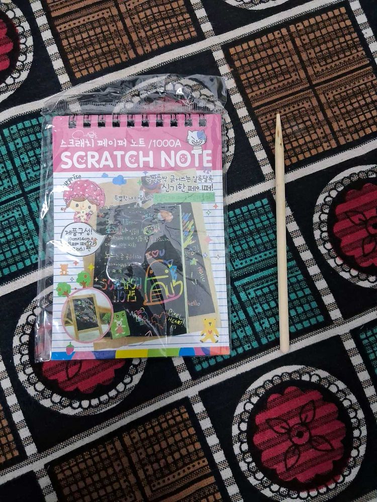 Scratching Note Book With Sktick