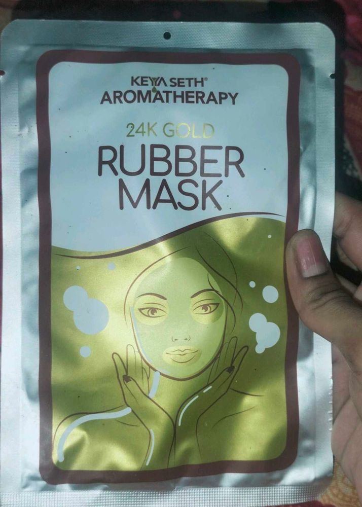 Keya Seth Rubber Mask. It is made by 24K gold dust