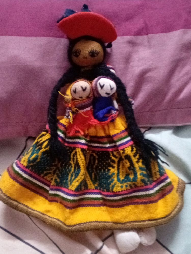 Handmade Doll Holding 3 Babies