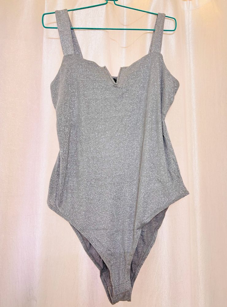 Silver Shimmery Bodysuit And Pink Top For Sruthi