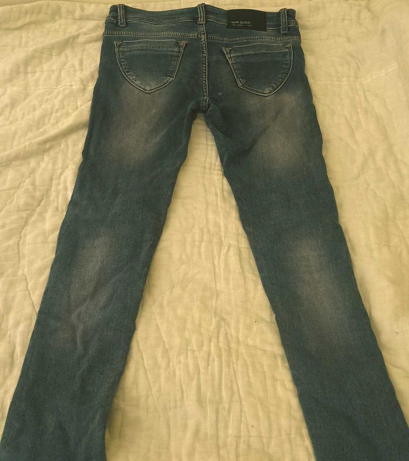 Worn Blue Denim Jeans
