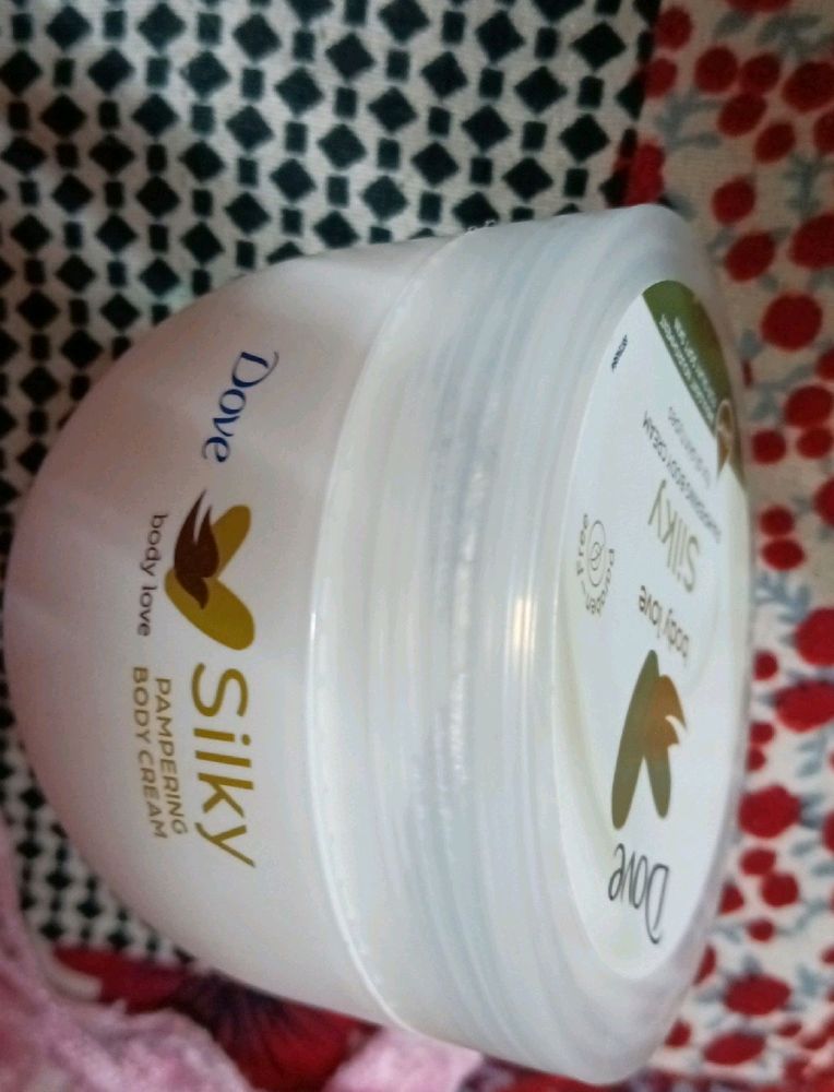 it is a moisturizer, new, unused, dove silky pampering cream body love
