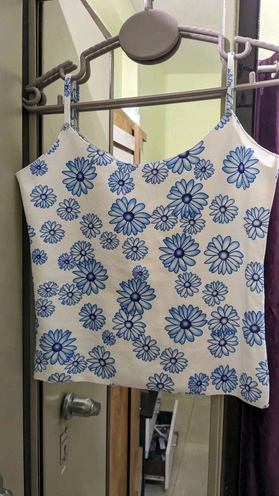White Top With Blue Flower